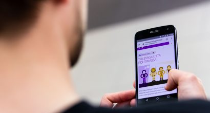 Man looking at his mobile phone