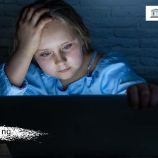 Girl in front of laptop