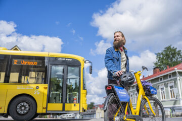 Yellow bus and bycykle.