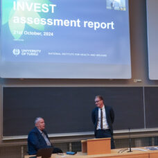 Juho Saari and Jani Erola in front of the lecture room