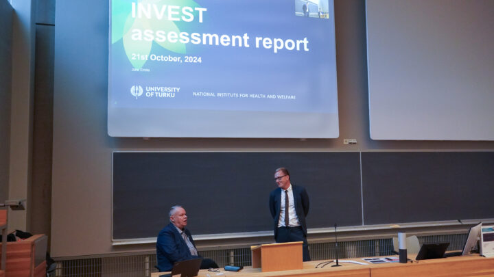 Juho Saari and Jani Erola in front of the lecture room