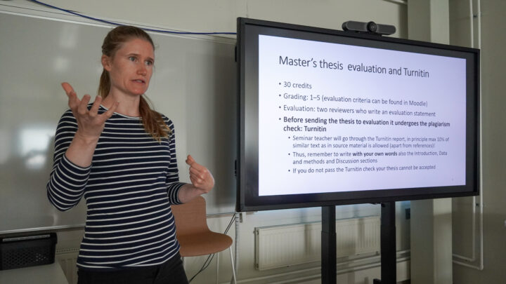 Mirkka Danielsbacka lecturing.