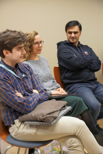 Three researchers at the cource.