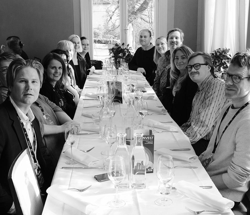 INVEST Conference dinner, people sitting on table