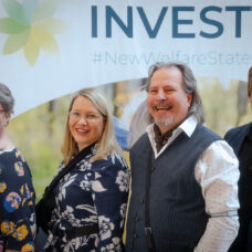 Smiling people at INVEST Conference