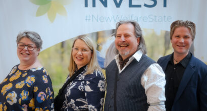 Smiling people at INVEST Conference