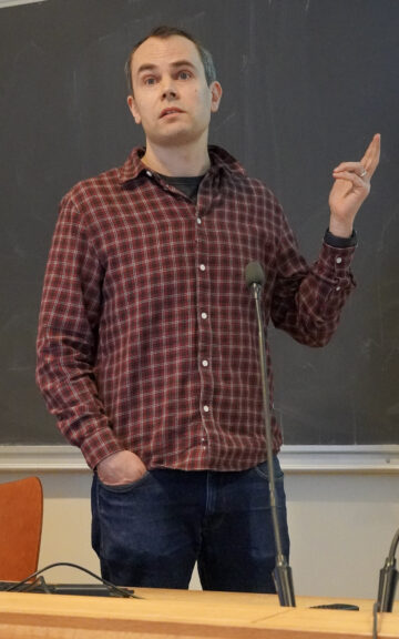 Henri Salokangas speaking.