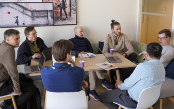 Group of people discussing.